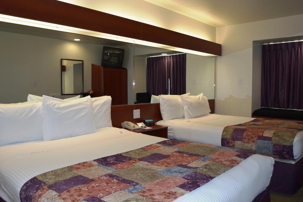 Microtel Inn And Suites By Wyndham Miami Ok Стая снимка